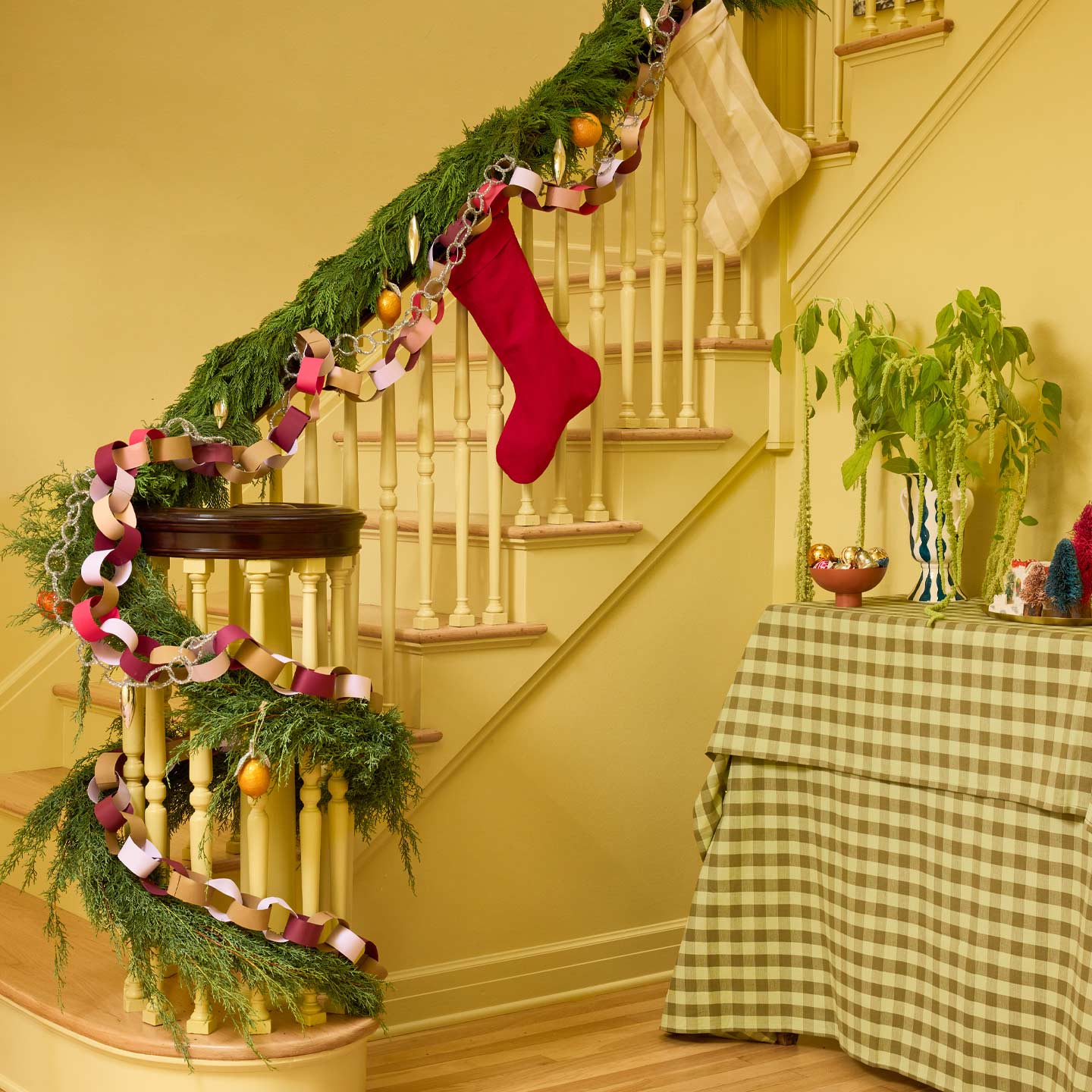 Stairway with garlands and stockings.