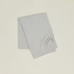 A Linen Washed Waffle Throw Blanket in natural.