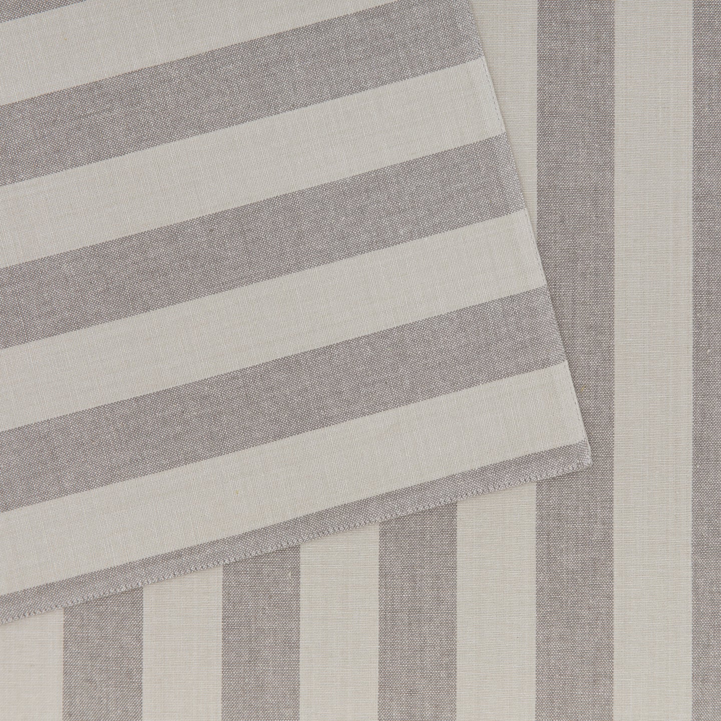 Close up of Essential Striped Placemat in Light Grey and Dark Grey.
