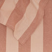 Close up of Essential Striped Tablecloth in Blush and Terracotta.