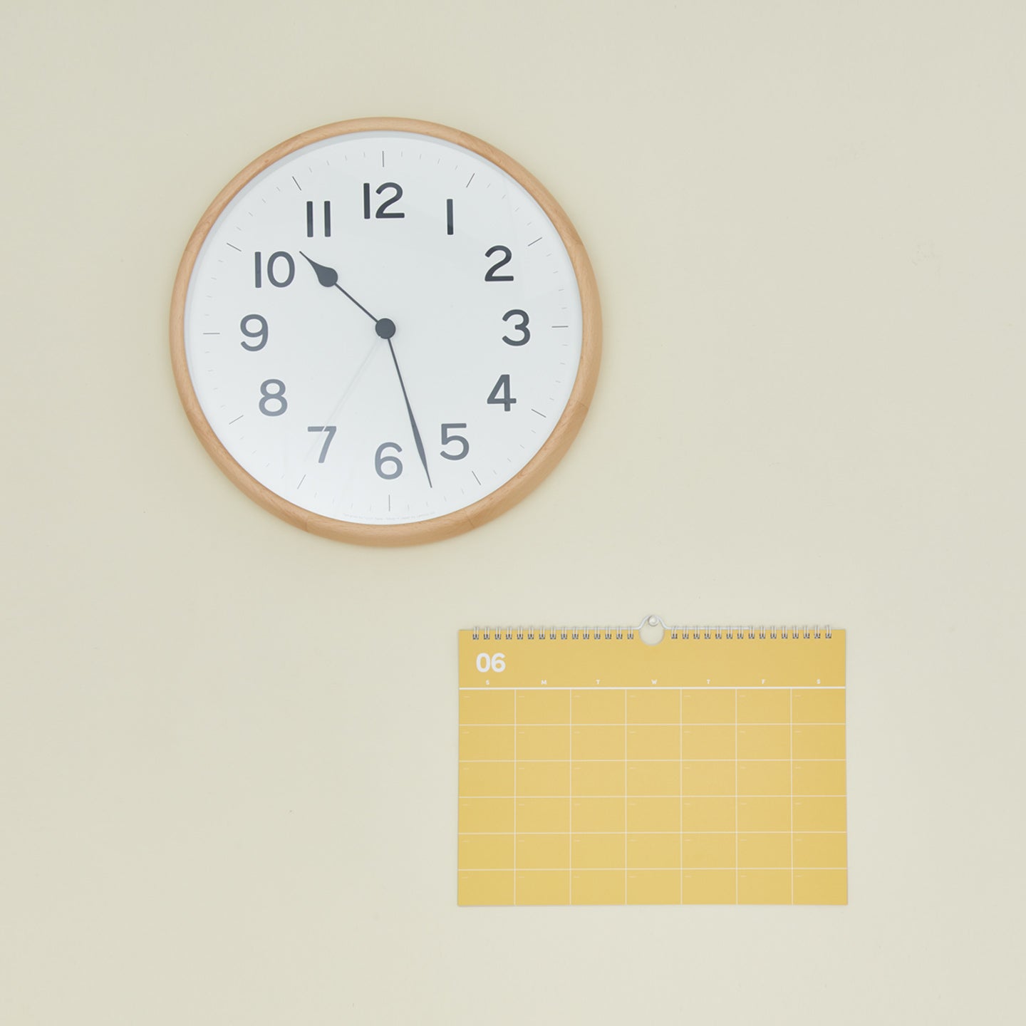 Natural wall clock with calendar