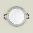 Overhead view of copper two handled sautee pan