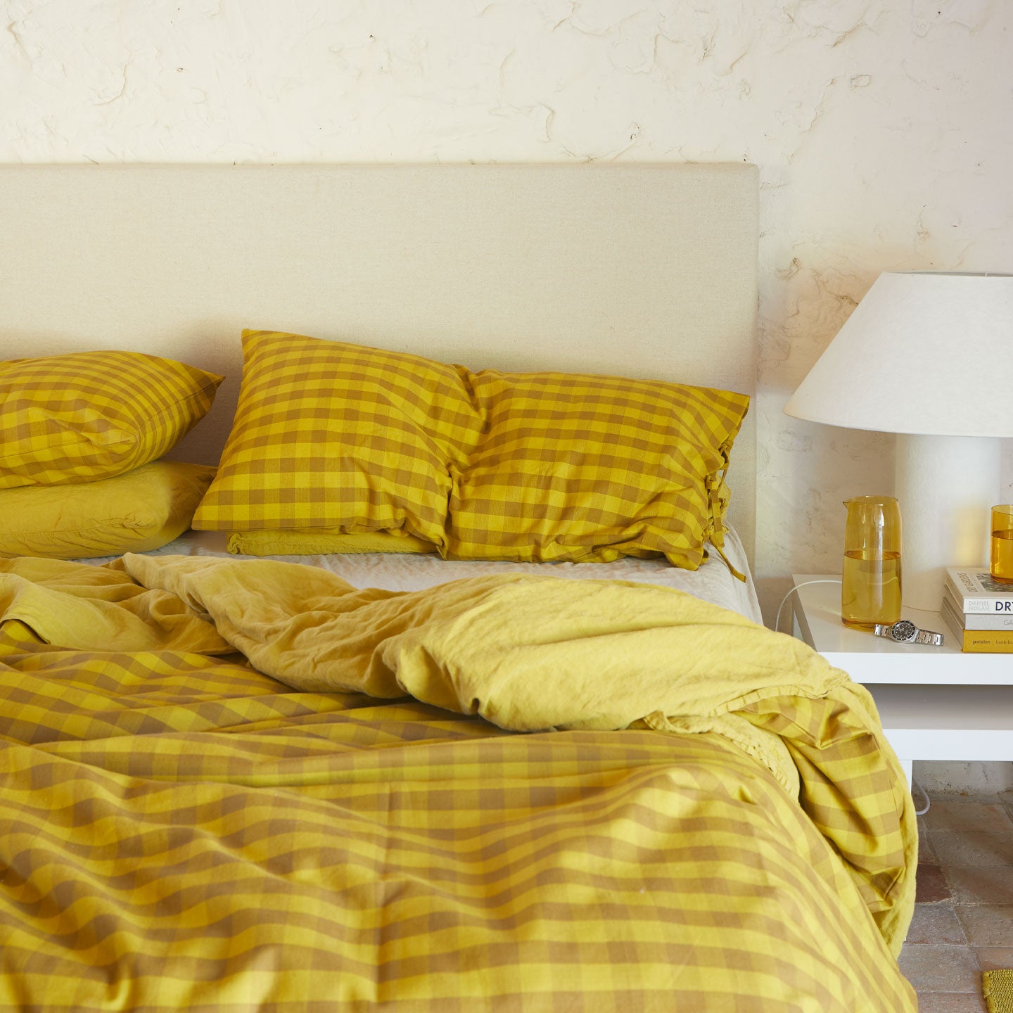 Essential Gingham Bedding in Mustard with nighstand.