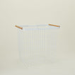 A modern steel laundry basket. 