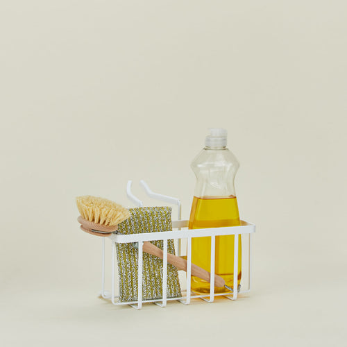 A modern hanging sponge caddy. 