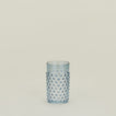 Textured blue glass tumbler.