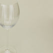 Close up of ribbed clear wine glass.