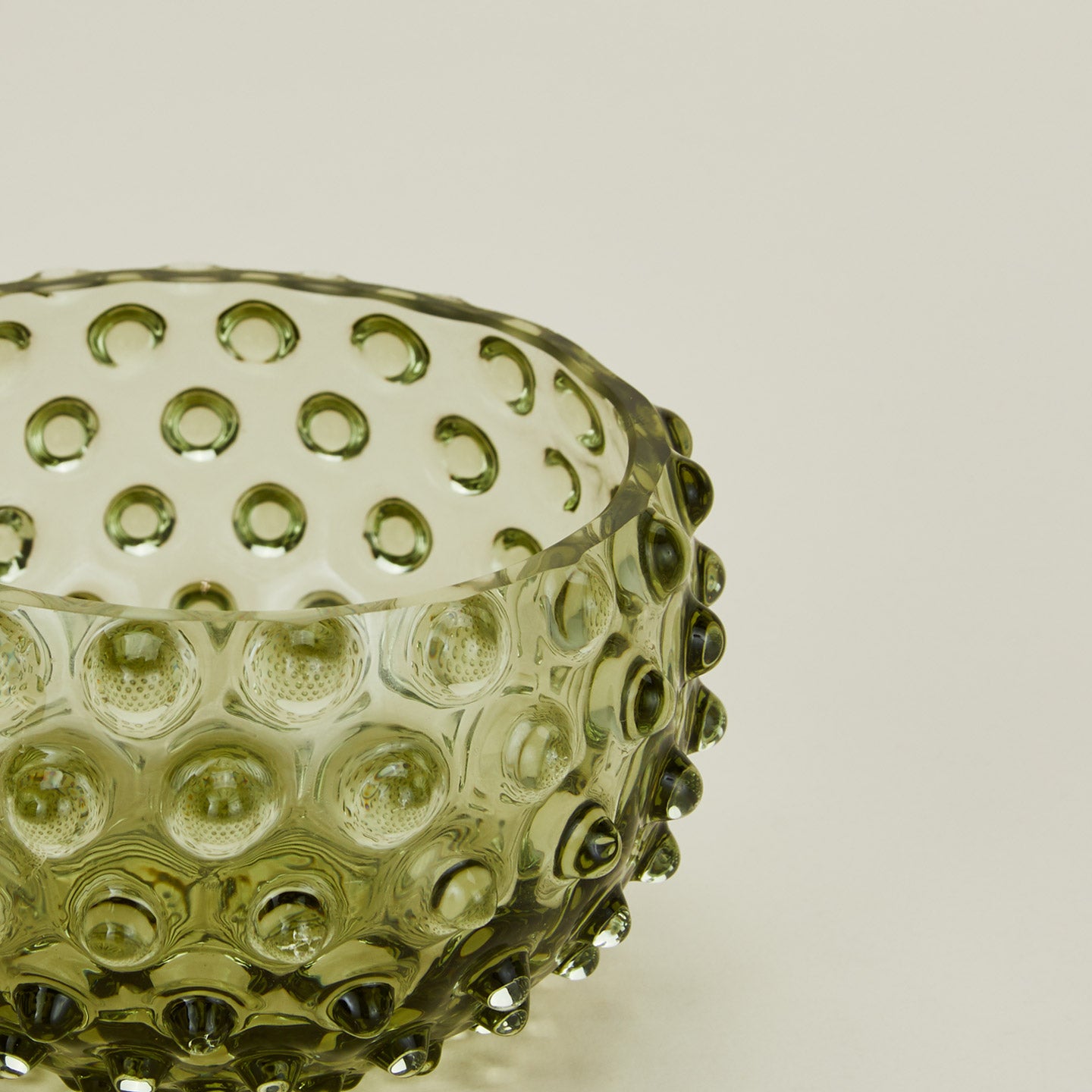 Close up of glass hobnail olive tapas bowl.