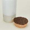 Detail view of Atelier Trema garlic keeper with cork lid