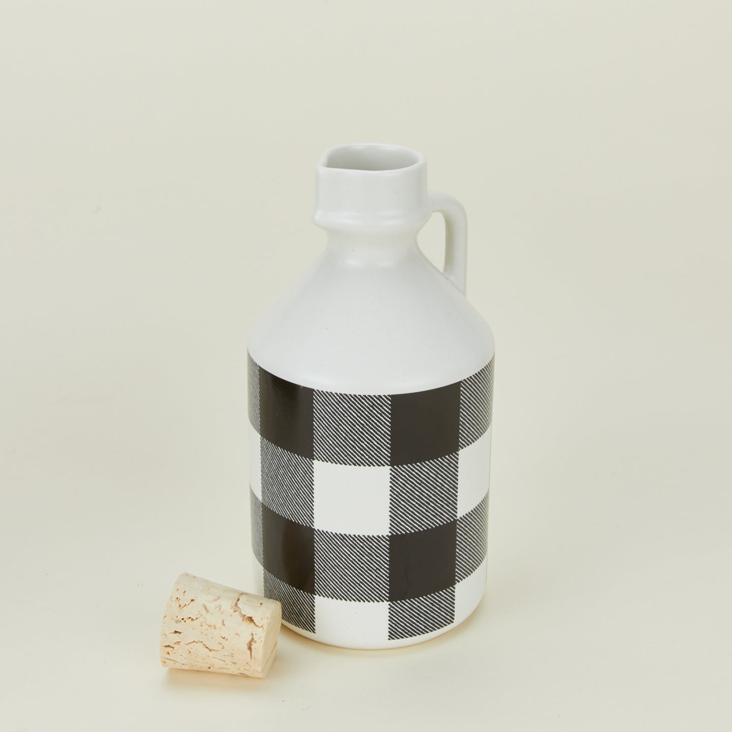 Close up view of Atelier Trema maple syrup jar with cork lid