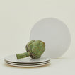 Four Atelier Dinner Plates, with green beans.