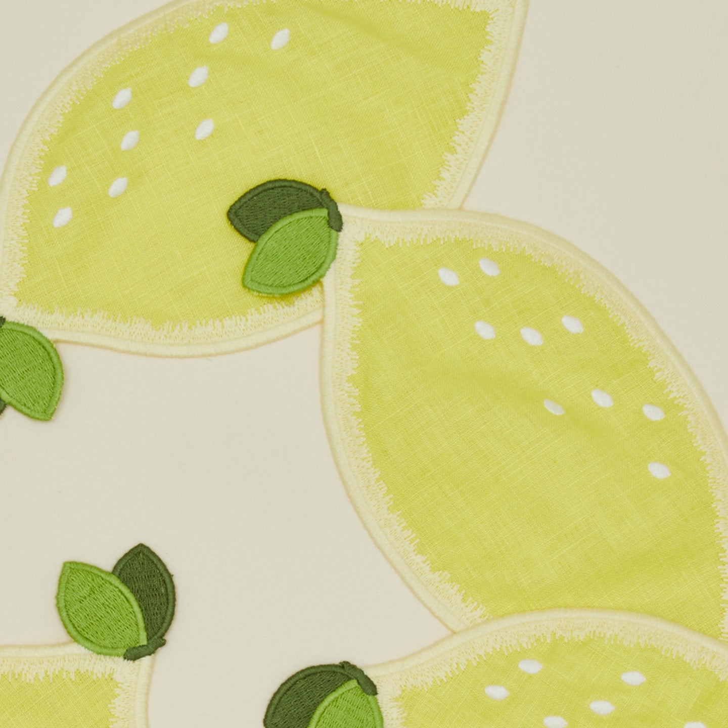 Close up view of lemon cocktail napkins, set of 4