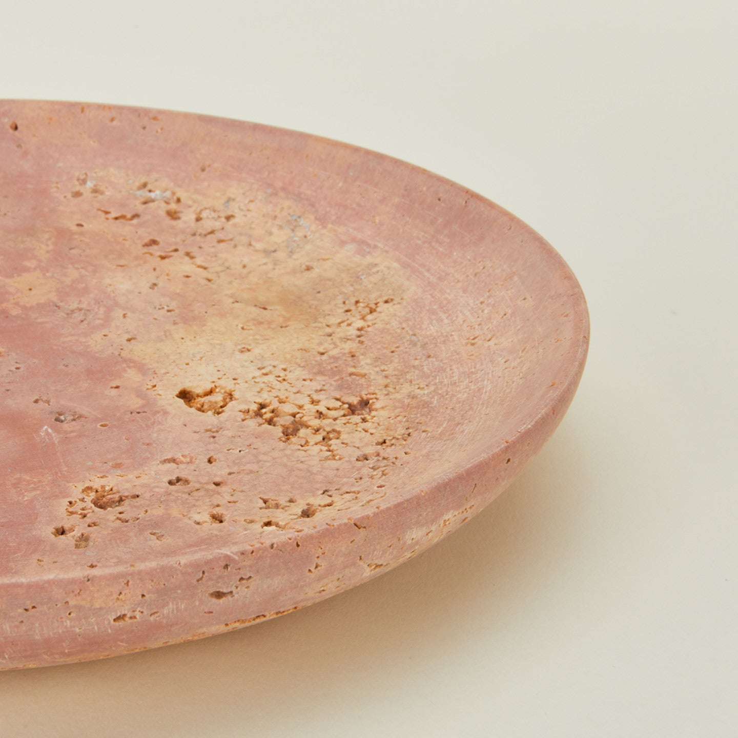 Close up view of red travertine tray