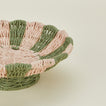 Close up view of Bloomingville woven rope footed bowl.