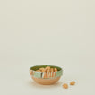 Mini marbleized glazed bowl with brazil nuts
