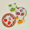 Tomato cocktail napkins with plates and flatware
