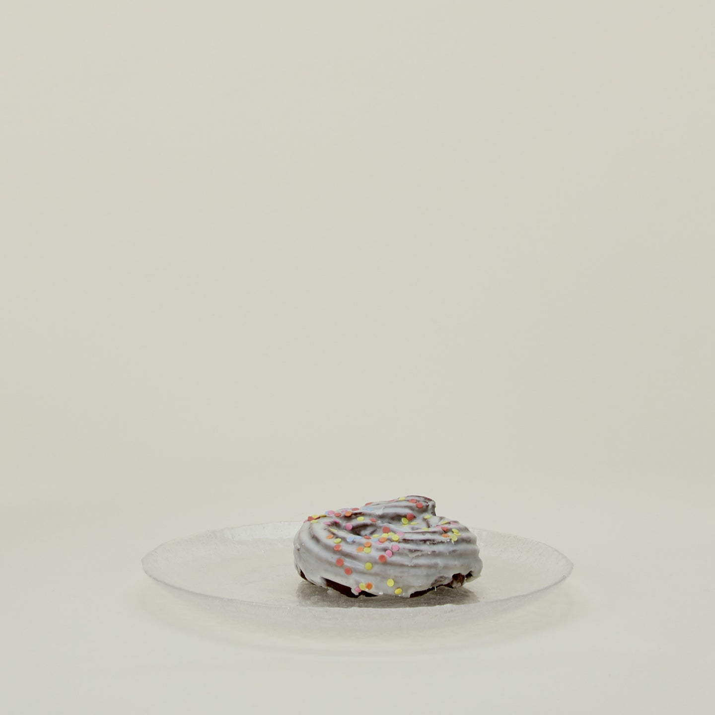 Glass Dinner Plate in Clear, with donut.