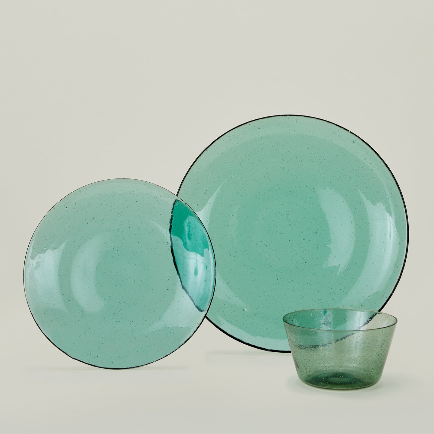 Group of Jade glass dinner plate, dinner plate and bowl.