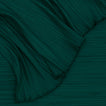 Detailed view of Cahaya pleated tablecloth in olive
