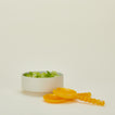 Lemon Yellow Salad Servers with salad in bowl