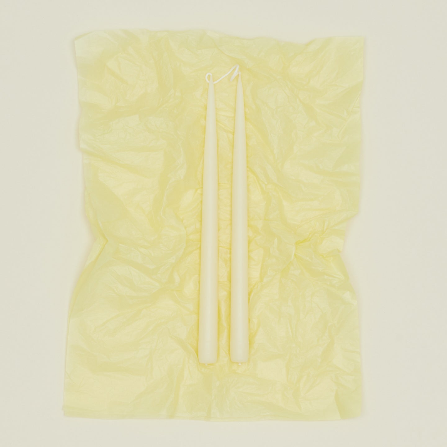 Danica taper candle pair in ivory