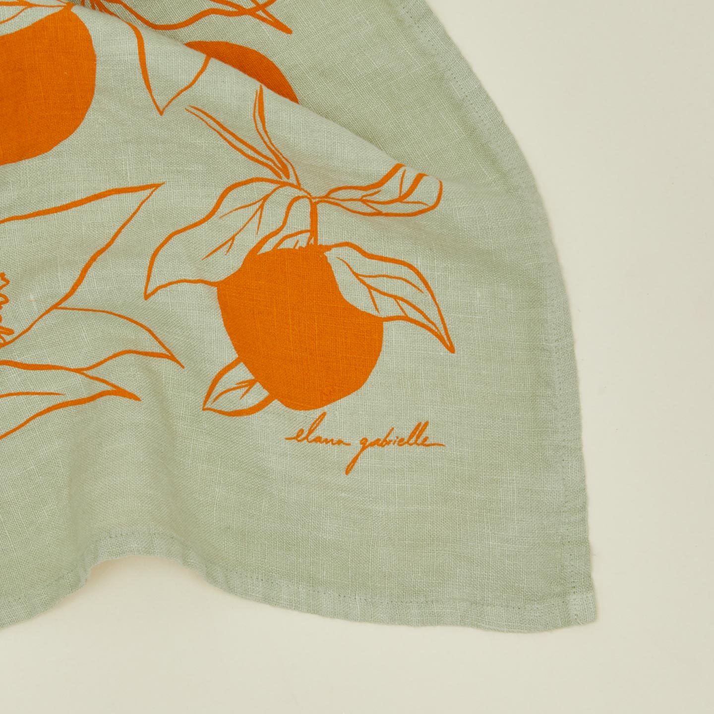 Close up view of clementine tea towel