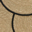 Close up view of essential woven placemats in black