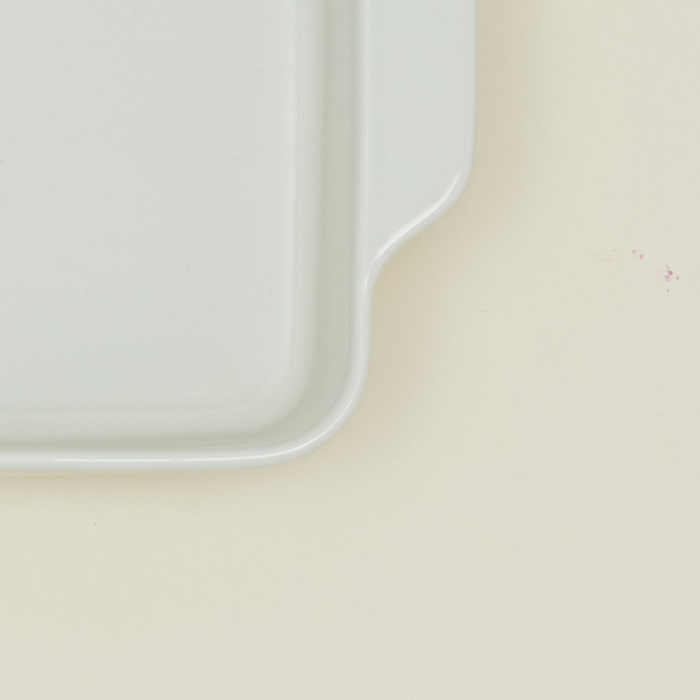 Close up view of 8" x 8" essential bakeware in bone