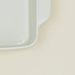 Close up view of 9" x 13" essential bakeware in bone