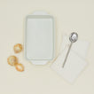 9" x 13" essential bakeware in bone with onions, spoon, and oven mits