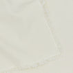 Close up view of essential cotton placemat in ivory