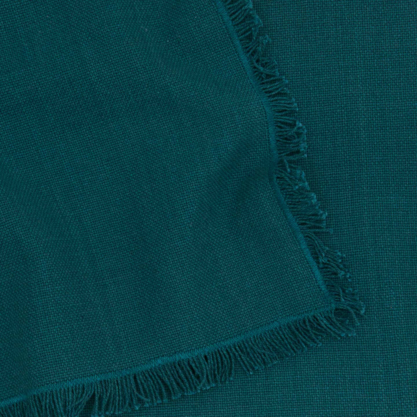 Close up view of essential cotton placemat in peacock