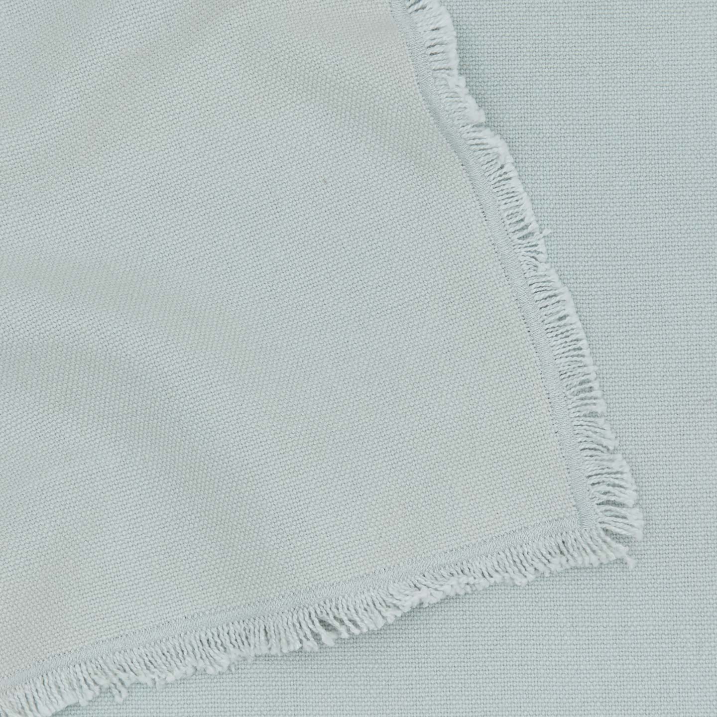 Close up view of essential cotton placemat in sky