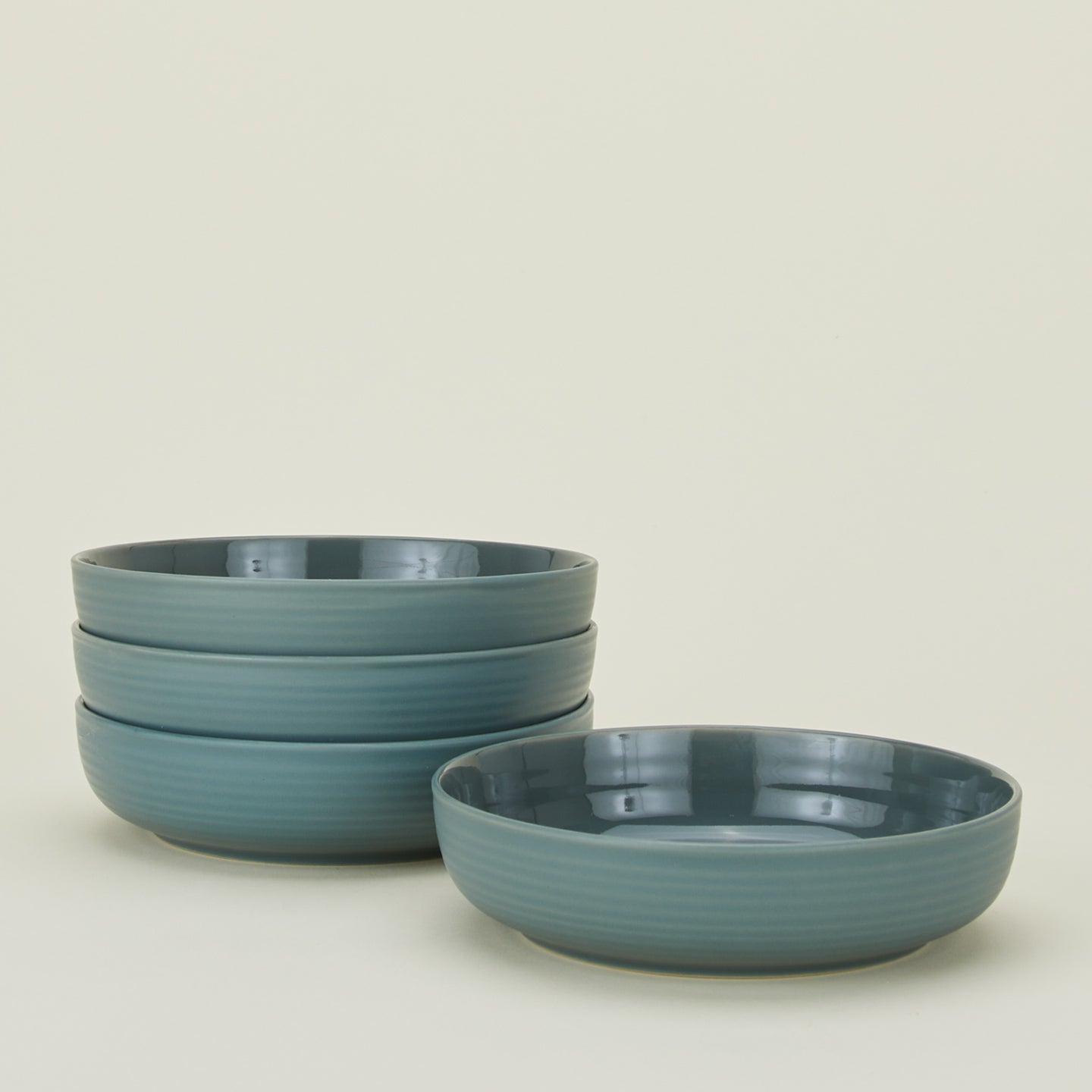 Set of 4 essential low bowls in peacock