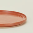 Close up view of essential dinnerware salad plate in terracotta