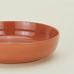 Close up of essential dinnerware low bowl in terracotta