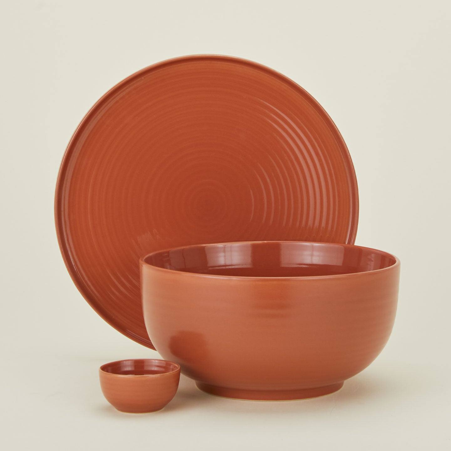 Essential serveware set in terracotta with platter serving bowl and extra small bowl