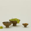 Essential footed bowl family in olive