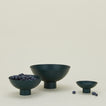 Essential footed bowl family in peacock