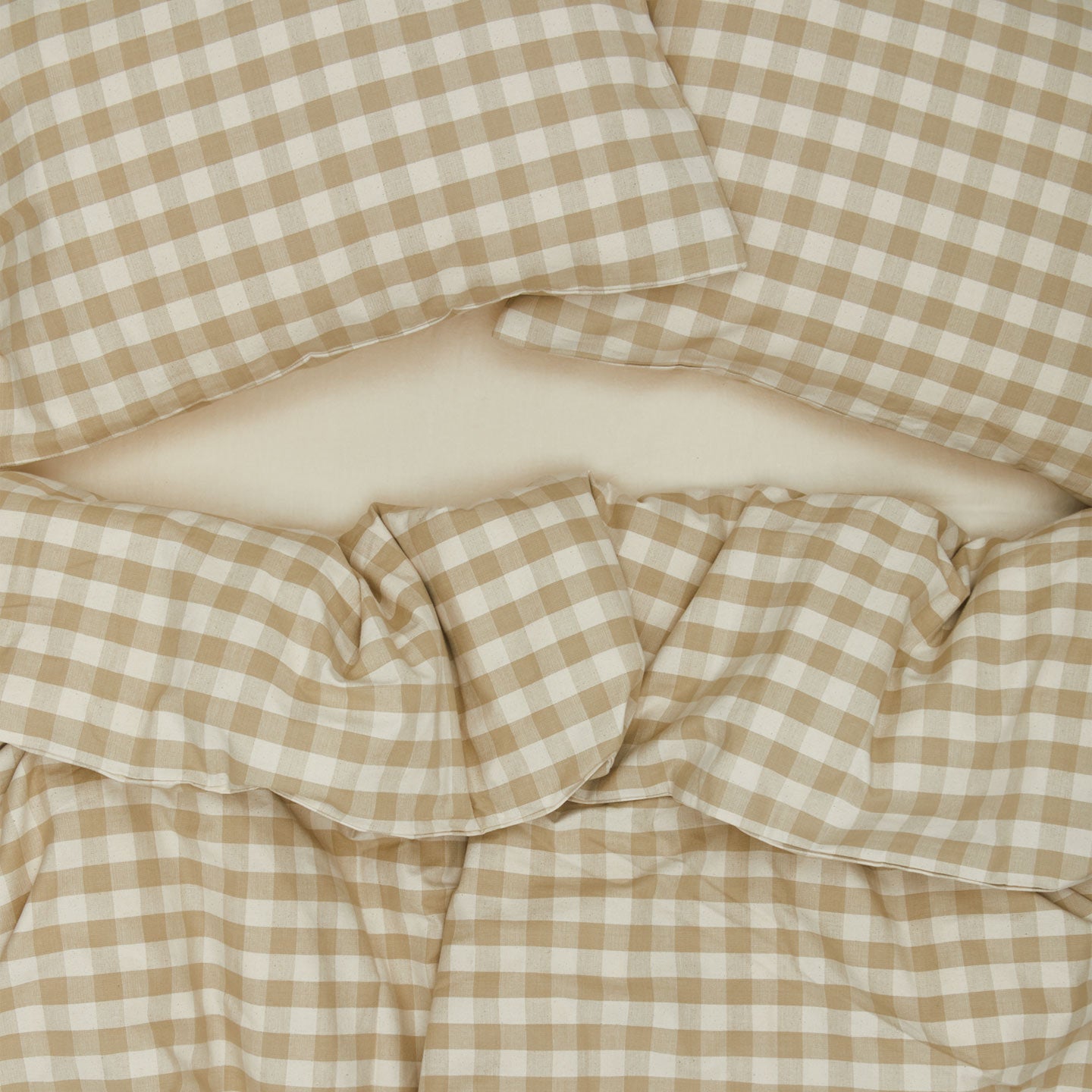 Essential Gingham Duvet - Ivory/Flax on bed with matching pillow cases