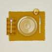Essential Gingham napkin in mustard/bronze with place setting