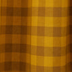 Close up view of gingham shower curtain in mustard/bronze