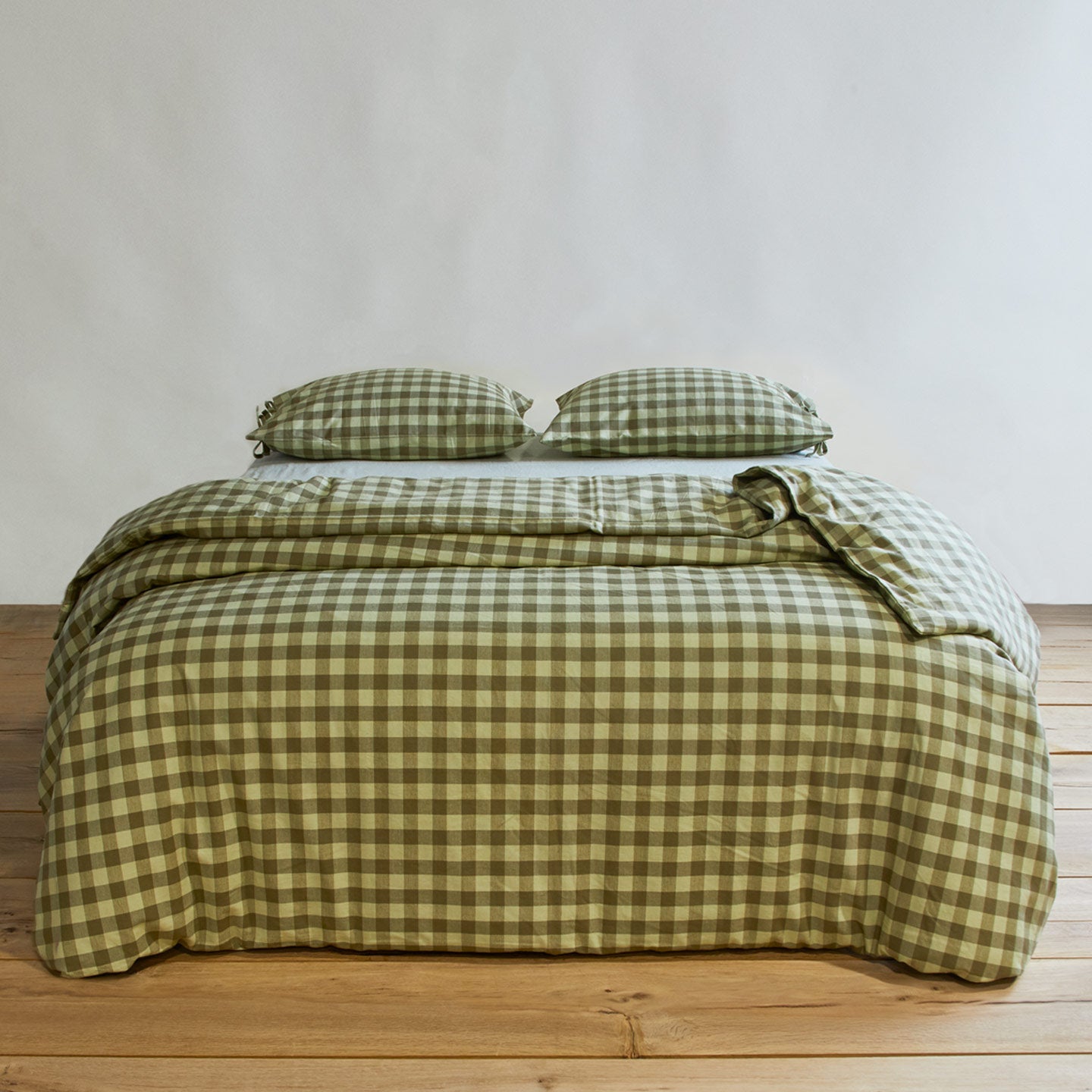 Essential Gingham Duvet - Sage/Olive on bed with matching pillow cases