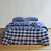 Essential Gingham Pillowcases, Set of 2 - Sky/Blue on bed with matching duvet