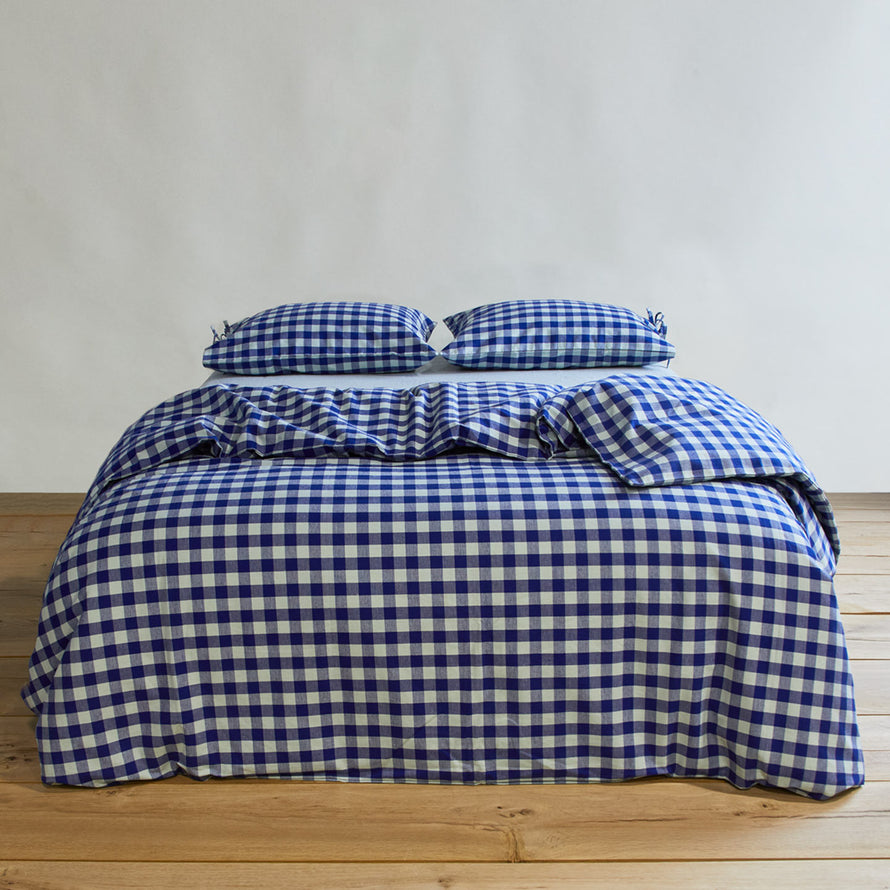 Essential Gingham Pillowcases, Set of 2 - Sky/Blue on bed with matching duvet