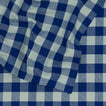Close up view of Essential Gingham tablecloth in sky/blue