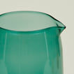 Close up of the rim of the Essential Glassware Pitcher in Peacock.