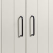 Large black pulls on white doors