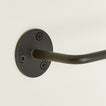 Close up of toilet paper holder in Black