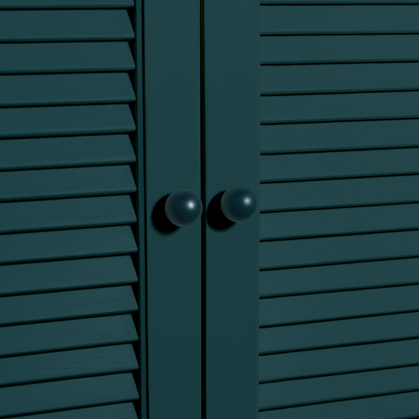 Small peacock essential sphere knobs on louvered doors 